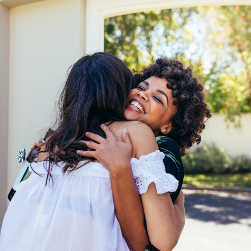 two women hugging